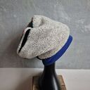 Czapka patchworkowa bardzo ciepła na podszewce uszyta z różnych gatunków materiału prezentuje się ni