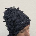 Piękna czapka zimowa w gwiazdki, sylwestrowa i świąteczna