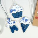 Ceramiczny zestaw choinkowych zawieszek piernikowy ludzik, ciasto i lód