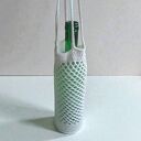 Ręcznie robiona ozdobna osłonka na butelkę