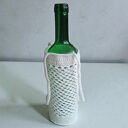 Ręcznie robiona ozdobna osłonka na butelkę