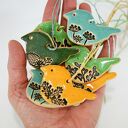 Ceramiczne ptaszki leśne z szyszką