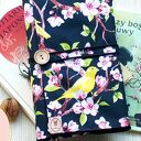 Wodoodporne etui na książkę/notes: kanarek w kwiatach