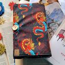 Wodoodporne etui na książkę/notes: ogniste smoki