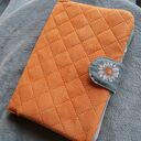 pomarańczowy pikowany organizer