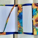 Wodoodporne etui na książkę w słoneczniki z zakładką