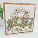 Kartka świąteczna z zimowym kubkiem i napisem „Wesołych Świąt”