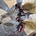 Klipsy zwariowane lekkie dlugie piora i kwiaty uwaga poezja:ona patrzy na mojego męża