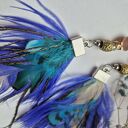 Klipsy leciutkie turkusowe pióra mogą być zamienione na kolczyki polecam wykonane w pojedynczym egze