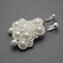 białe klipsy sutasz