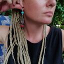 Kolczyki orientalne boho z pomponami - ślubny look w odcieniach turkusu i fioletu