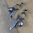 Kolczyki - perły z piórkami