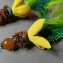 Duże kolczyki pióra i kwiaty w stylu boho - lekkie, efektowne i unikatowe