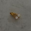 gustowne złote kolczyki z bezbarwnymi