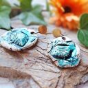 Duże ceramiczne kolczyki z motywem morskich muszli