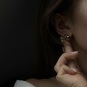 Złote kolczyki falowane koła