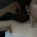 Kolczyki z różowego złota z kokardkami i perłami SWAROVSKI CRYSTAL