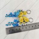 Długie kolczyki kwiatowe handmade - żółte róże, rumianki i niebieskie kwiaty