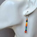 Bajecznie kolorowe kolczyki w modnym stylu boho długie efektowne w sam raz na lato super prezent