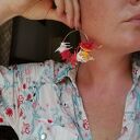 Kolczyki boho-folk - lekkie koła z kolorowymi piórami Ruda Klara