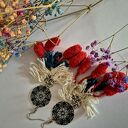 Kolczyki boho z pomponami - lekkie i efektowne