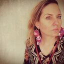 Kolczyki boho w formie bujnych kół z kwiatami i frędzlami