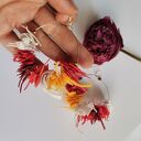 Kolczyki boho-folk - lekkie koła z kolorowymi piórami Ruda Klara