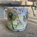 Porcelanowy kubek ręcznie malowany Kot w dmuchawcach