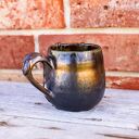 Kubek z smokiem Spiżowy czarno-złoty - kamionka 320 ml (z talerzykiem)
