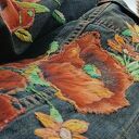 Jeansowa kurtka z haftem i aplikacjami maki