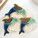 Ceramiczny delfin - magnes na lodówkę