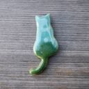 Ceramiczny magnes kot turkus z zielonym