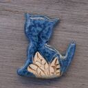 Ceramiczny magnes kot niebieski