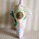 Mini piesek Mela - miękka maskotka handmade dla maluszka