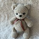 Miś Dante z kokardką w kolorze różowym