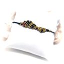 Bransoletka RYBA z rubinem naturalnym w mikromakrime - czarno-złota, regulowana (do 26 cm)