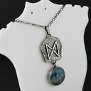 Runa Dagaz z agatem wężowym - srebrny amulet przemiany