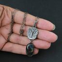 Runa Laguz z labradorytem - srebrny talizman ochronny