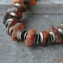 srebrny naszyjnik z surowymi bryłkami bursztynu