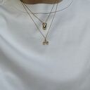 Złoty naszyjnik z hantlą