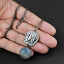 Runa Dagaz z agatem wężowym - srebrny amulet przemiany