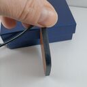Skórzana zawieszka w brązach na czarnym rzemieniu - minimalistyczny naszyjnik handmade