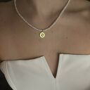 Naszyjnik z pereł naturalnych ze znakiem zodiaku z różowego złota