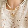 Srebrny naszyjnik z ozdobnym zapięciem i naturalną perłą perełka gruby