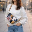 Pikowana torebko nerka z weluru Caracas