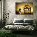 Obraz na płótnie kot i papuga w klatce 120x80 cm