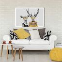 Nowoczesny obraz drukowany na płótnie - 120x80 cm para jeleni w zółtych sweterkach