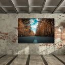 Obraz na płótnie Droga przez jesienny las 120x80 cm
