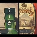 Obraz do kuchni - butelki alkoholu na drewnianej półce vintage 70x50 cm