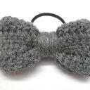 Wełniana kokarda do włosów - handmade na czarnej gumce